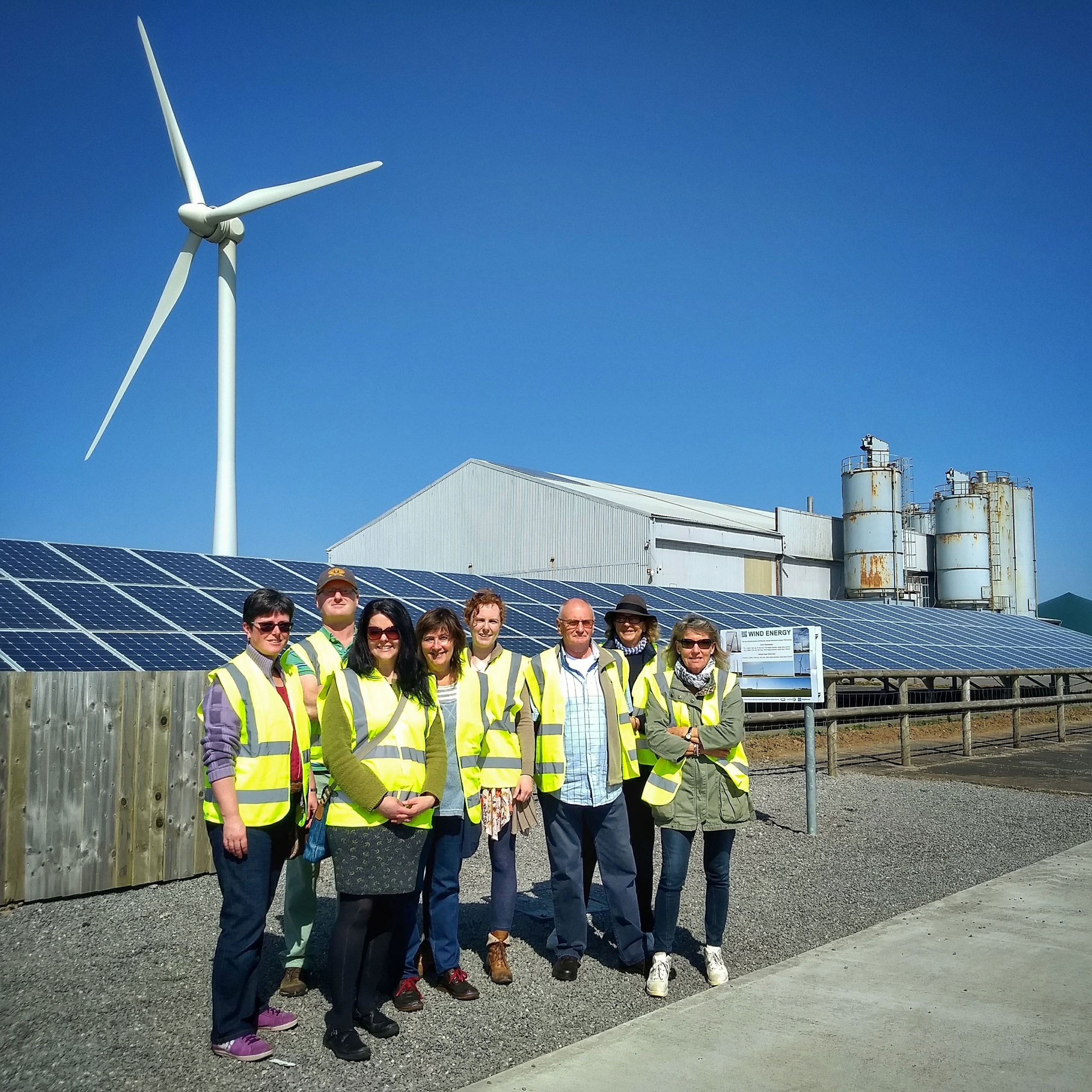 Photo of staff visiting a renewable energy farm